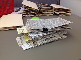 Stack of Newspaper Clippings