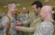 Governor Pawlenty promotes 1st Lt. Matthew Majeski, 1st Brigade Combat Team, 34th Infantry Division,...