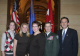 Governor Pawlenty poses for a photo with Brigadier General Joe Kelly and his family following Genera...