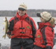 Governor Pawlenty, with First Lady Mary Pawlenty, catches a 17-inch walleye at 11:05 a.m. on the nor...