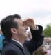 Governor Pawlenty takes a break from budget discussions to watch a 26 plane flyover, which is part o...