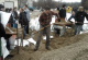 Governor Pawlenty assists in flood preparation efforts during his visit to the Moorhead area. Govern...