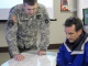 Governor Pawlenty meets with leadership of the Minnesota National Guard battalion assisting in flood...