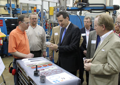 Governor Pawlenty visits and tours Minnesota Rubber & Plastics, a molder of high performance elastom...