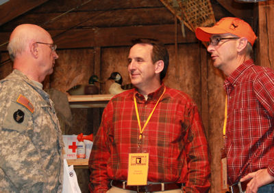 Governor Pawlenty visits with his brother Dan Pawlenty and the new Adjutant General of the Minnesota...